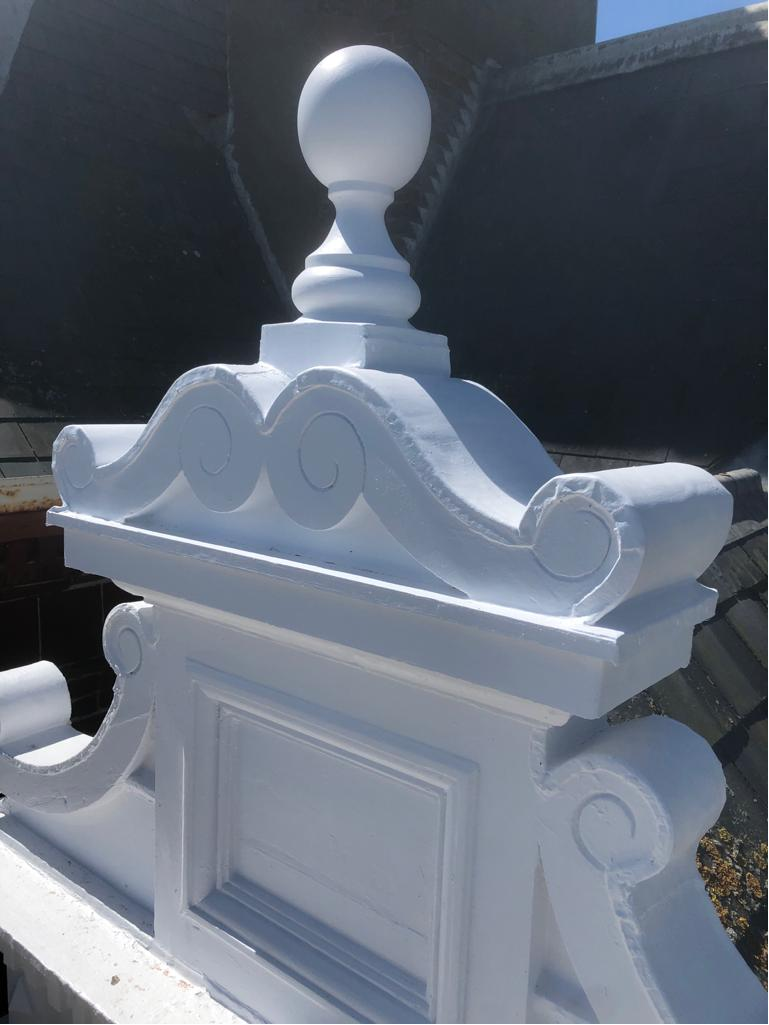 A property with freshly painted exterior masonry